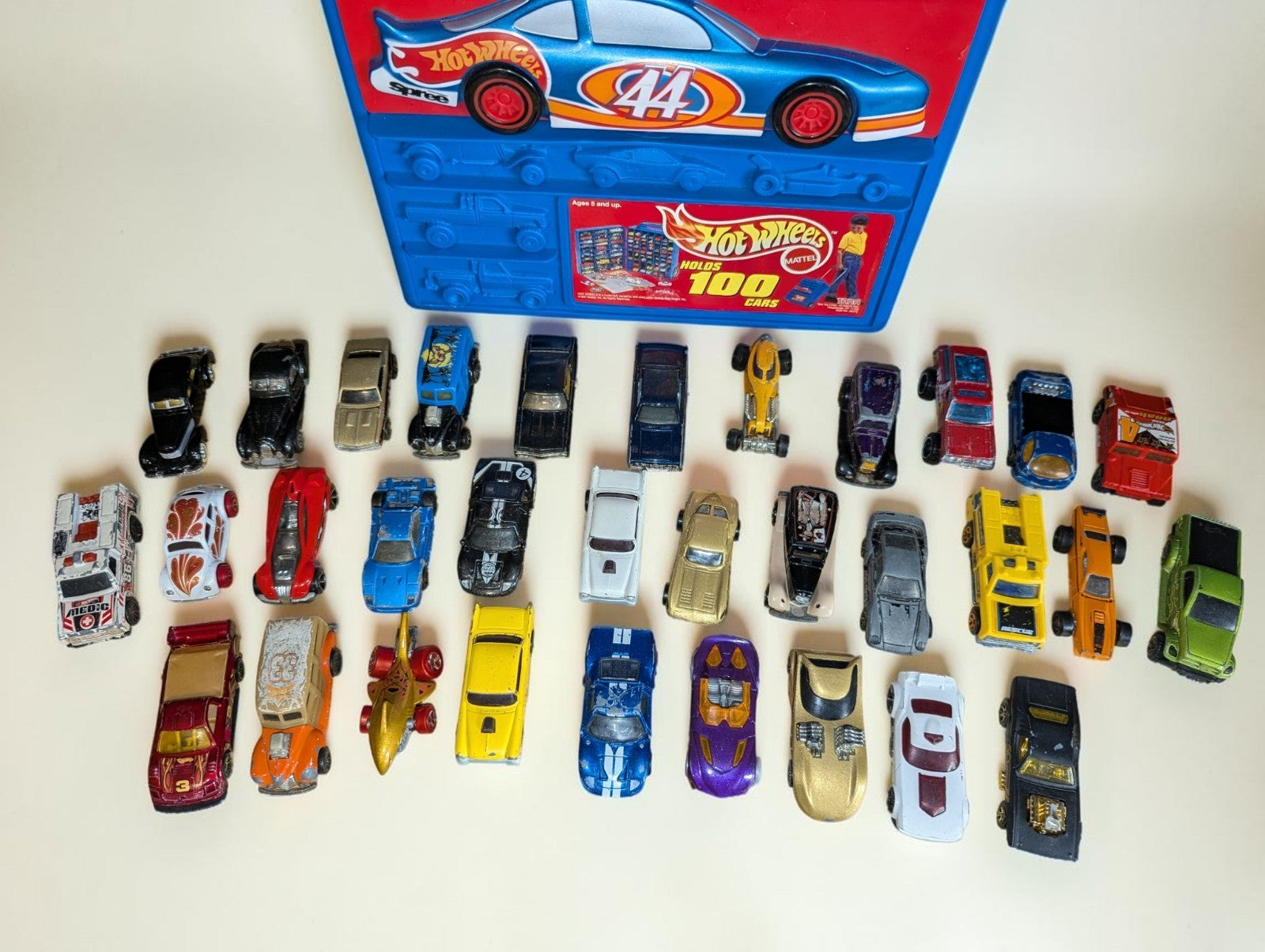 1997 Hot Wheels Storage Case with 32 Vintage Hot Wheels Cars (1970s-1999) Lot