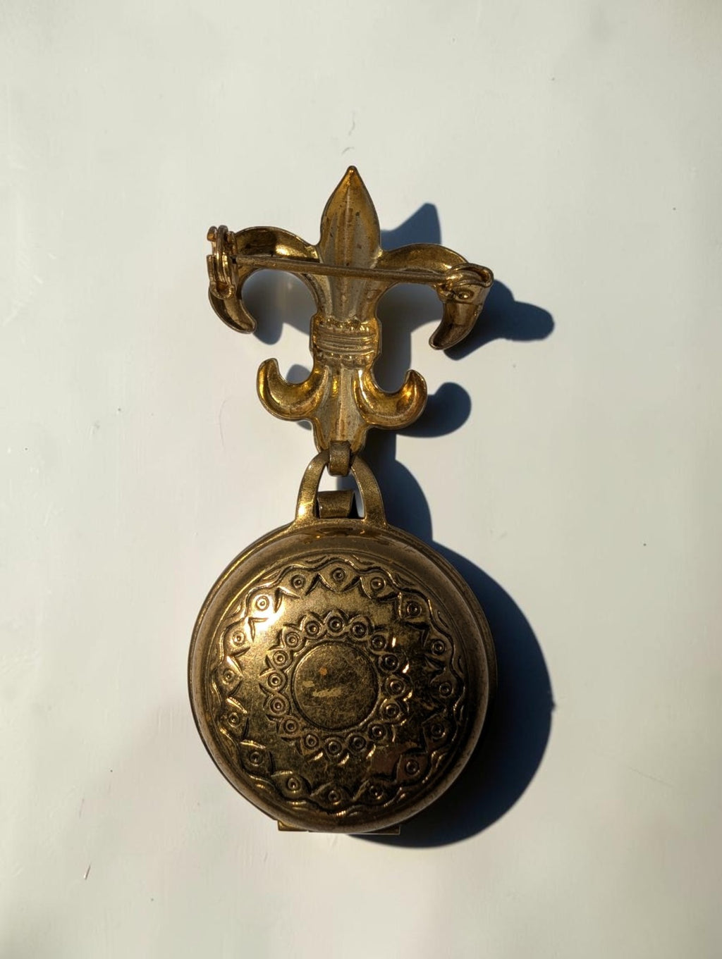 1940s  Brass Fleur-de-lis Round Locket Brooch