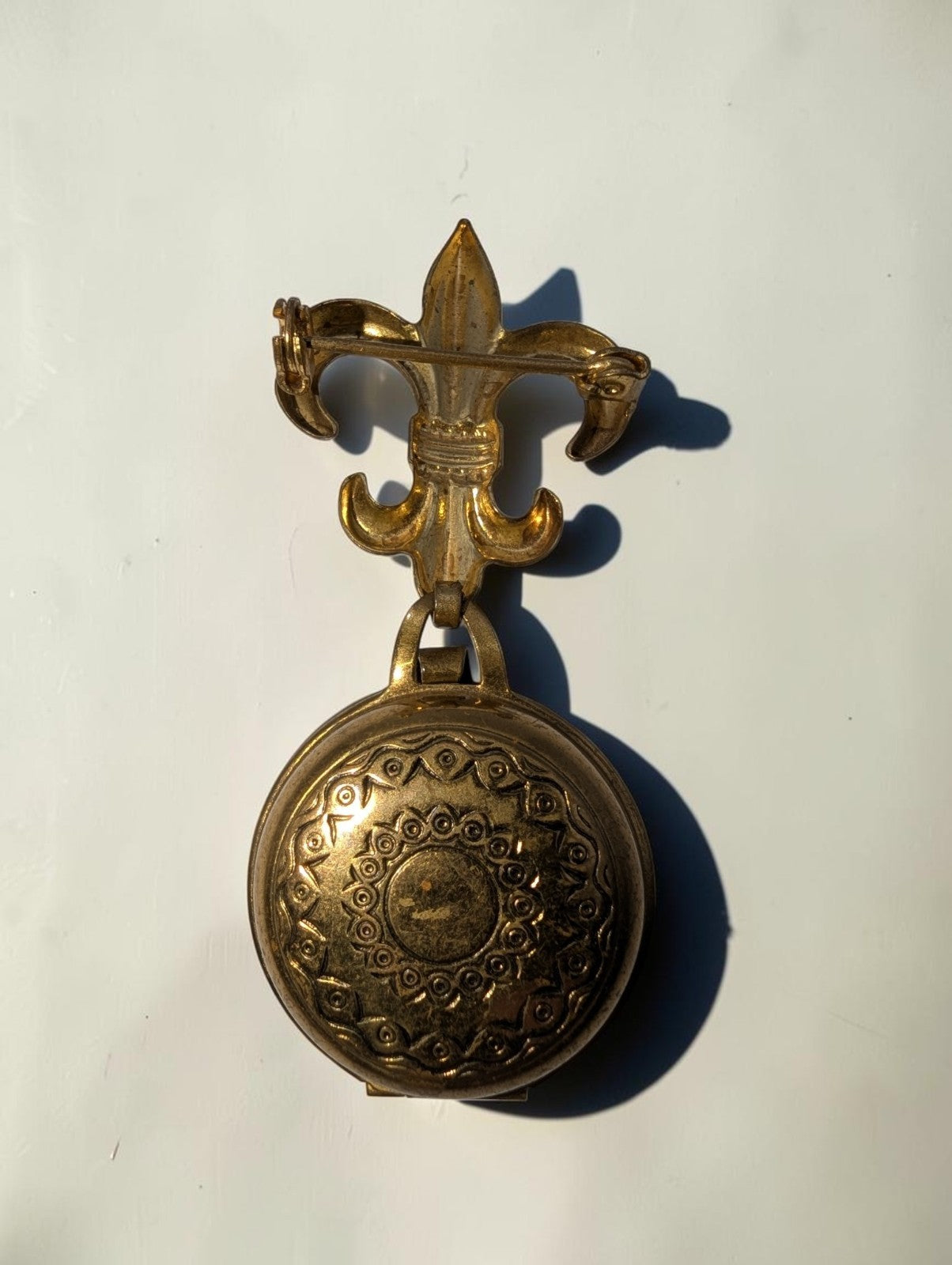 1940s  Brass Fleur-de-lis Round Locket Brooch