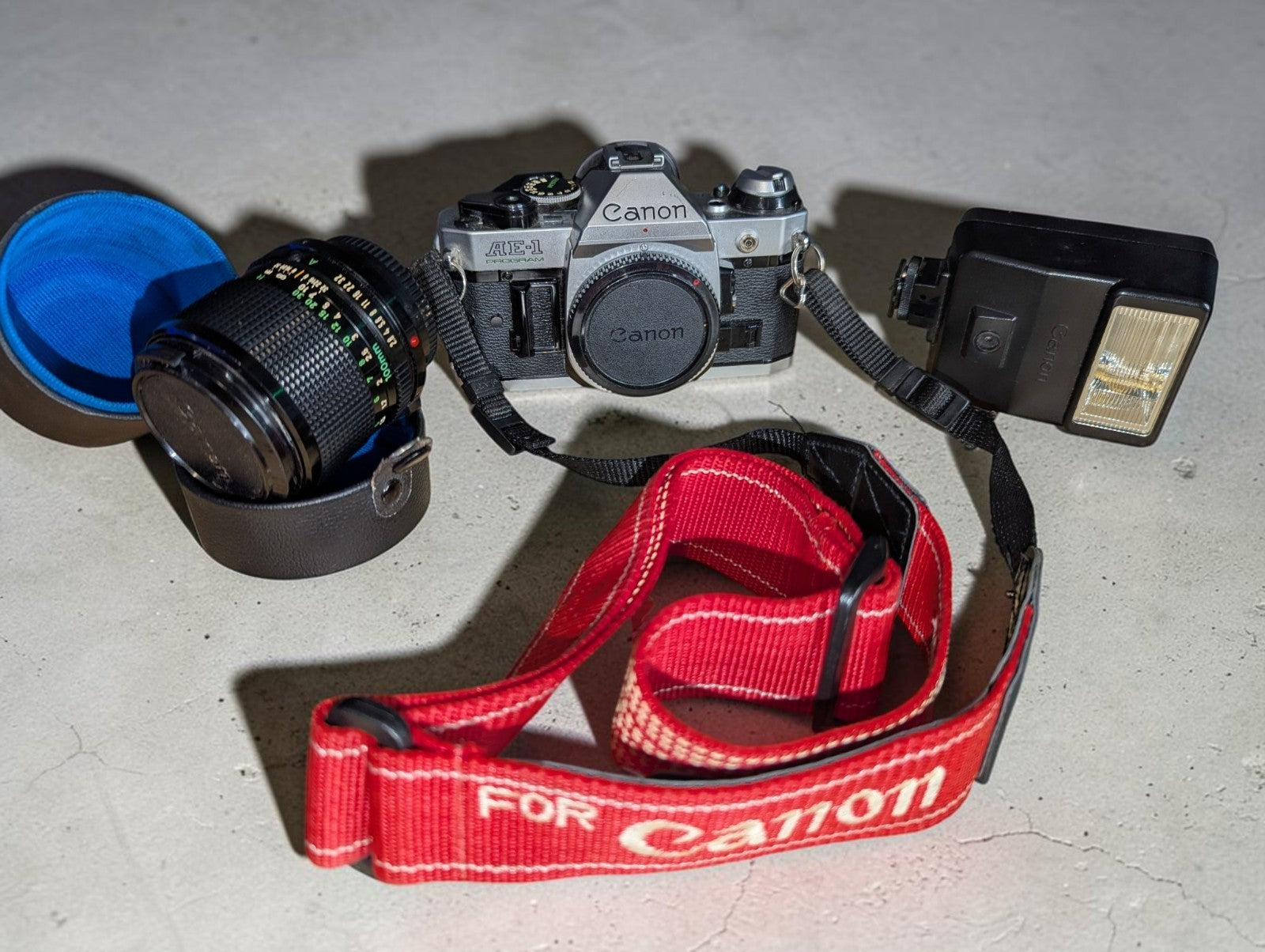 Vintage Canon AE-1 Program with FD 100mm Focus Lens and Speedlite 155A