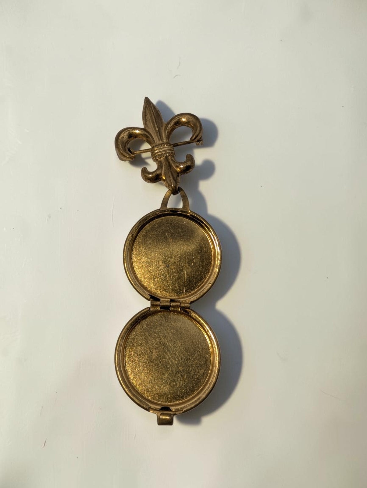 1940s  Brass Fleur-de-lis Round Locket Brooch