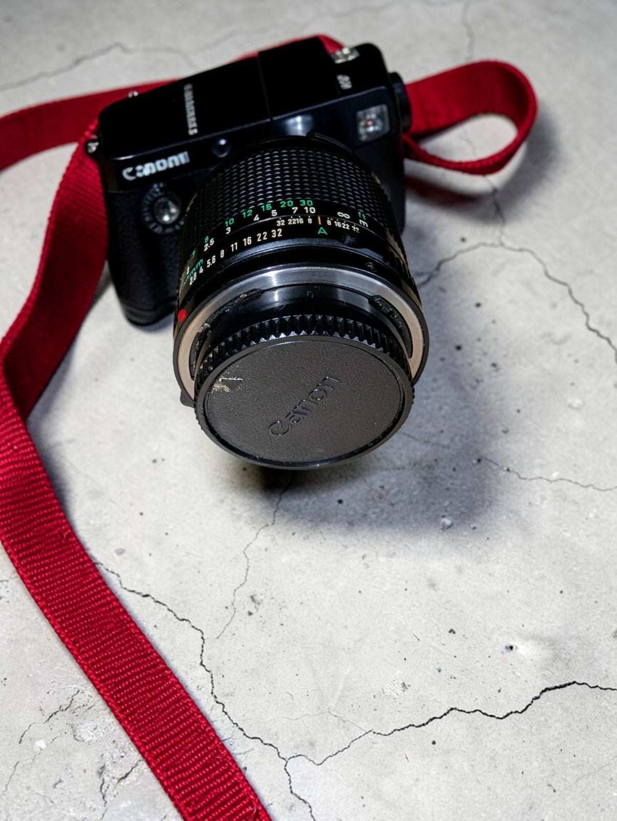 Vintage Canon AE-1 Program with FD 100mm Focus Lens and Speedlite 155A