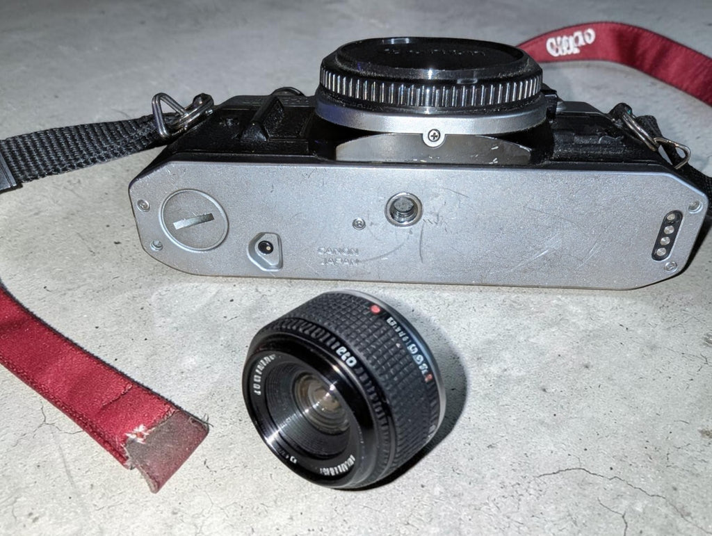 Vintage Canon AE-1 Program with FD 100mm Focus Lens and Speedlite 155A
