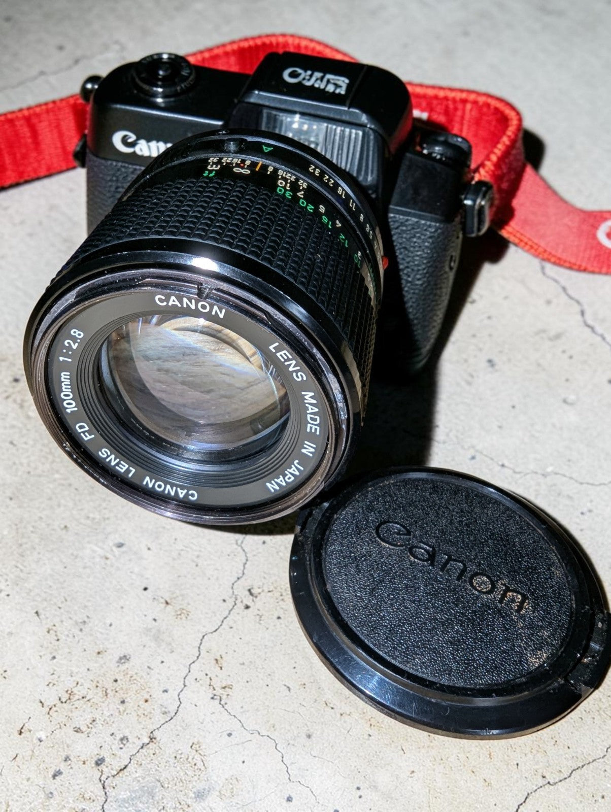 Vintage Canon AE-1 Program with FD 100mm Focus Lens and Speedlite 155A