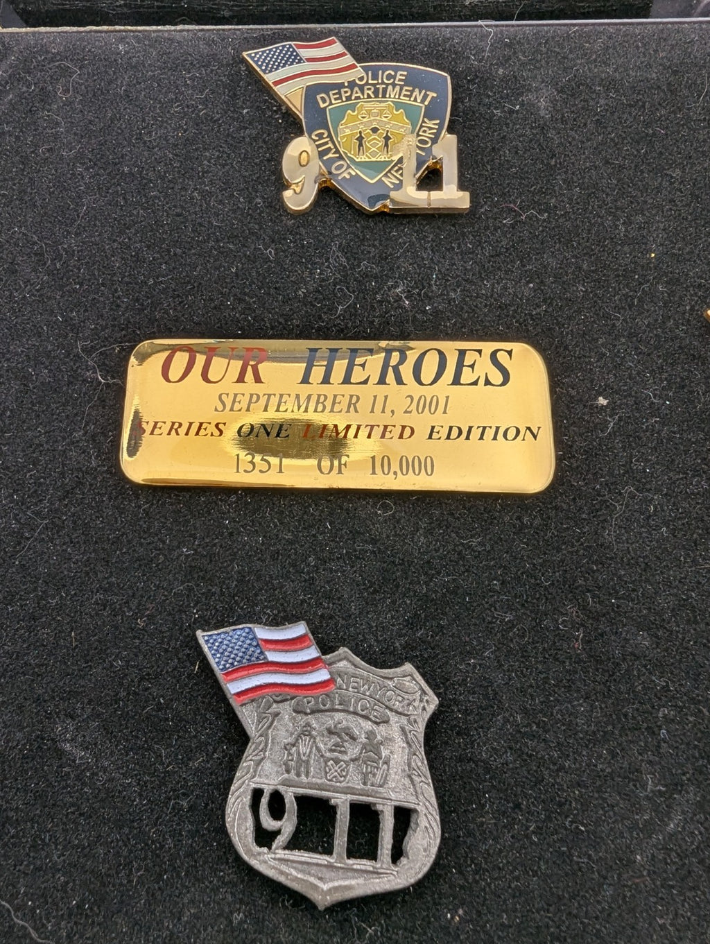 Collection of September 11, 2001 commemorative lapel pins (8)