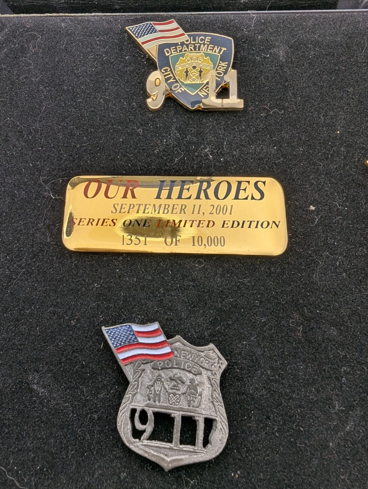 Collection of September 11, 2001 commemorative lapel pins (8)
