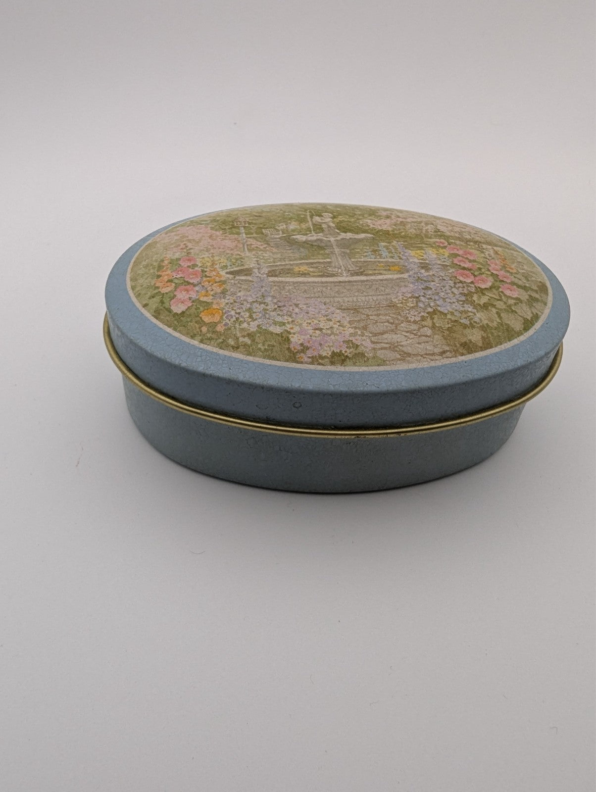 Vintage Oval Decorative Tin, Fountain and Flower, 3.5"x2"