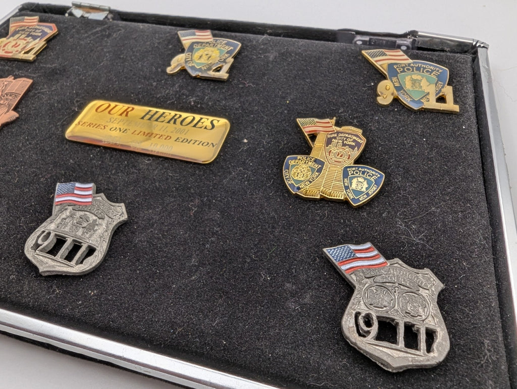 Collection of September 11, 2001 commemorative lapel pins (8)
