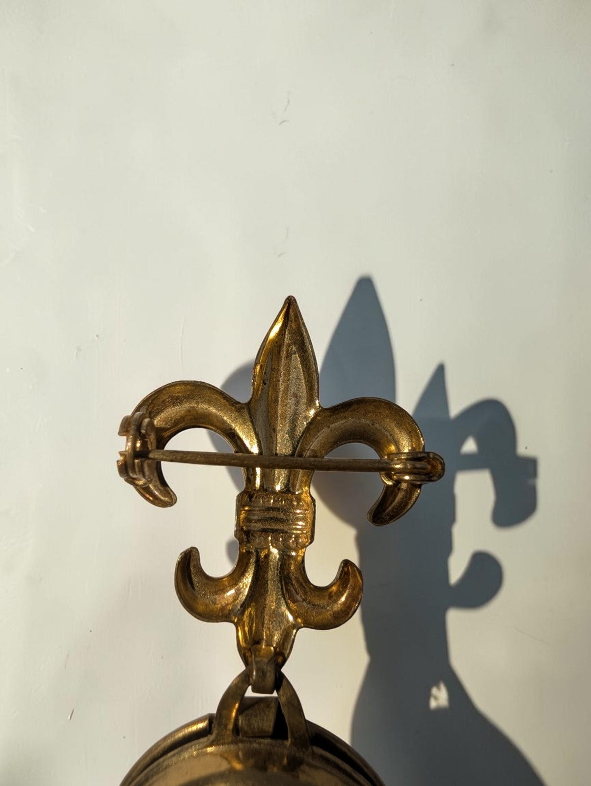 1940s  Brass Fleur-de-lis Round Locket Brooch