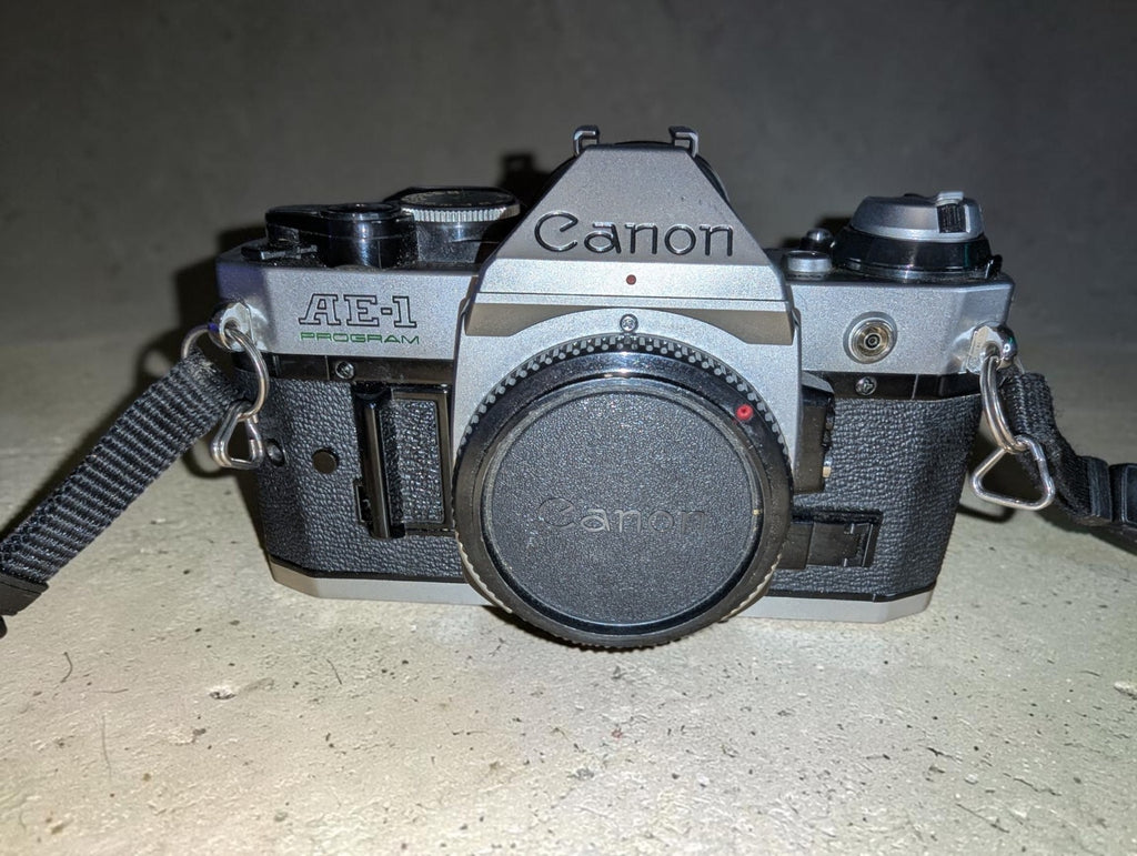 Vintage Canon AE-1 Program with FD 100mm Focus Lens and Speedlite 155A