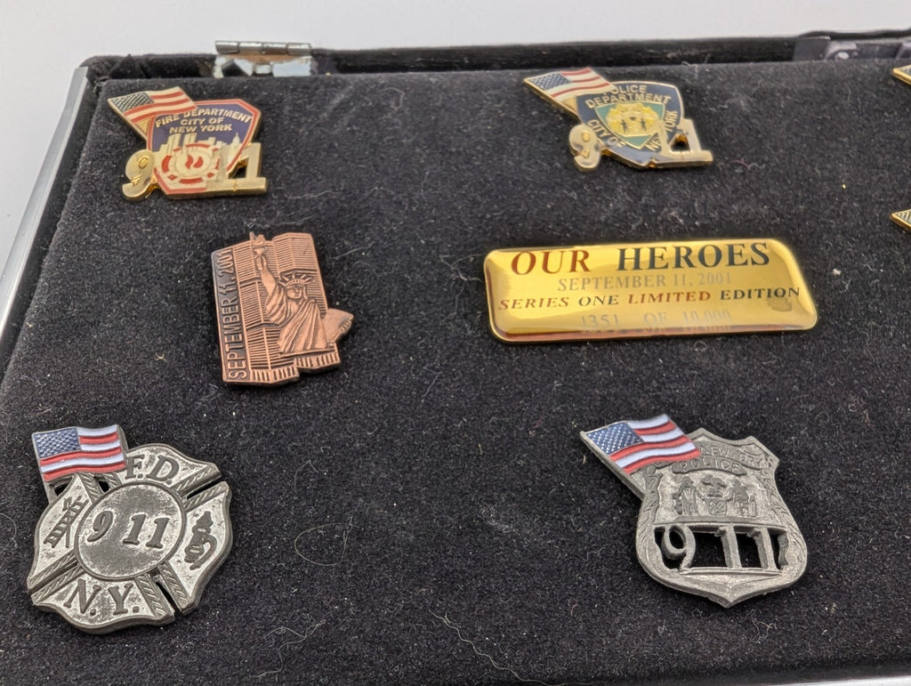Collection of September 11, 2001 commemorative lapel pins (8)