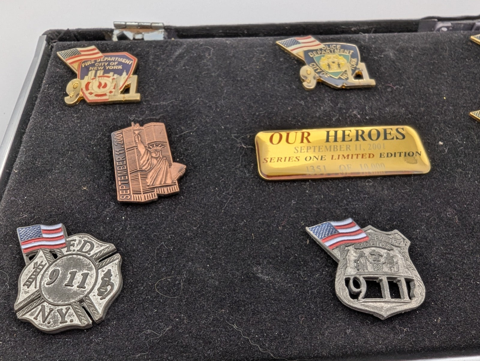 Collection of September 11, 2001 commemorative lapel pins (8)